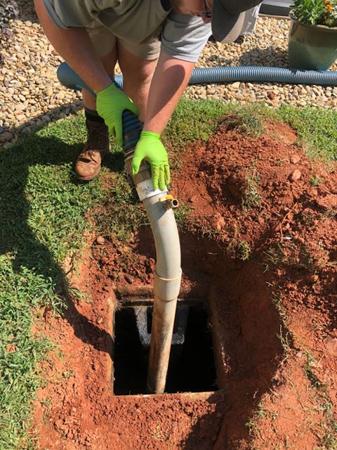 Stock photo of septic tank pumping